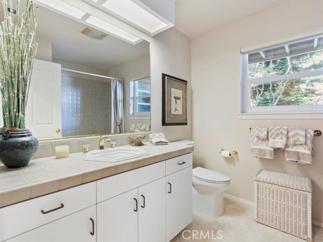Full bathroom next to the guest bedrooms.