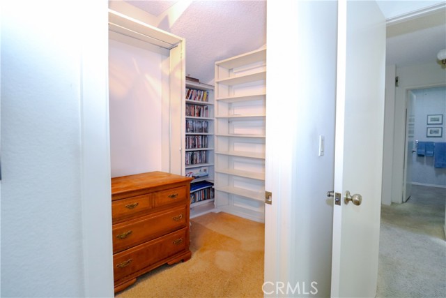 Another view of master walk-in closet.