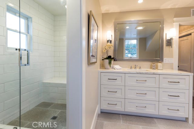 Dual sinks and cabinetry in the master bath.