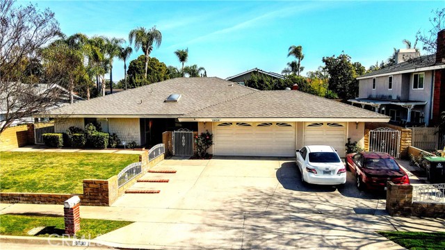 Welcome home to 3830 Madonna Dr in Fullerton! First time ever on the market, this single story, turnkey home has been lovingly maintained since 1977 by one owner and is located on a quiet cul de sac, featuring 4 bedrooms, 2.5 bathrooms and a 3 car attached garage. This home was remodeled in 2024. All new recessed lighting throughout, new carpet and paint, and new plantation shutters. Tile entry opens to living room with views of backyard. Family room features a wetbar and fireplace area and views of backyard. Formal dining area just off kitchen provides plenty of room for family gatherings. Kitchen is light and bright, with south facing bay window, pantry, storage and laundry room access. All restroom countertops vanities were updated and remodeled. Primary suite features a large walk-in closet, full bathroom, soaking tub, double vanity area and views of backyard. Low maintenance backyard features elevated lawn area, rose garden and very generous, paved full-length back patio and very large side yards. Plenty of toy parking on the south side yard. RV parking potential with a garage remodel is possible, or a pass through door from back of garage is possible. Big ticket items have been done, with new hvac system, all brand new ducting throughout, a new water heater, and new plumbing re-pipe. This location cannot be beat, with established neighbors on a quiet cul de sac. Walking and biking distance to in-tract, award winning Hermosa Elementary, and to Brea Creek and Fullerton golf courses.