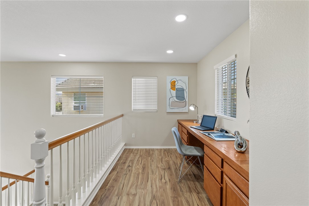 Built-in desk at top of stairs