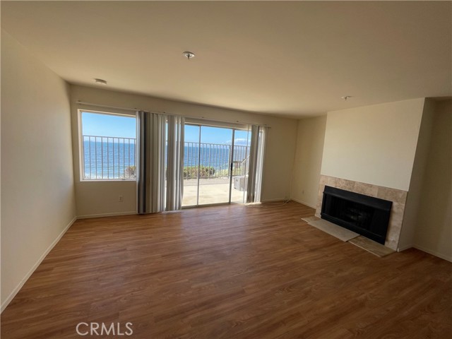 Downstairs family room and kitchen with patio feet away from the walking path