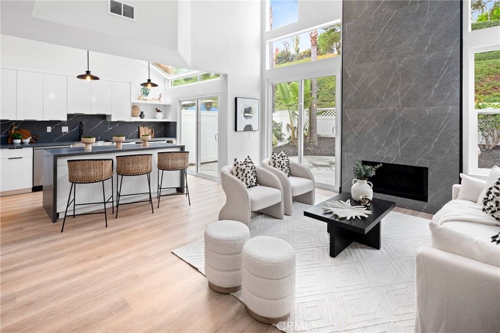 This completely remodeled home in Laguna Niguel offers a perfect blend of modern design and comfort. Every detail has been updated, from the brand new windows that invite in natural light to the sleek, modern kitchen and fully renovated bathrooms. The thoughtful layout includes a main floor bedroom and bathroom, providing convenience and versatility for guests or multi-generational living. Stylish new vinyl flooring flows throughout the home, complemented by fresh interior and exterior paint, and a new front door that adds to its curb appeal. Additionally, the home has been repiped, providing long-term durability and peace of mind.
Conveniently located near pristine beaches, scenic hiking trails, lush parks, premier shopping centers, and dining destinations, this home is perfectly situated for enjoying the best of coastal living. With its comprehensive upgrades, this turn-key residence is ready for its new owner to move in and enjoy.