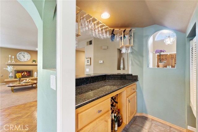 Dry bar area with pantry space.