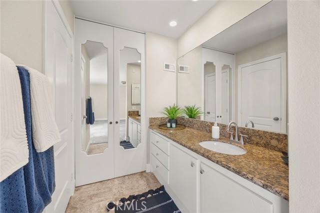 Finding a home with a primary suite is a total score! En suite has private commode and 2 walk in closets. Behind the double mirrored doors is a walk in closet.