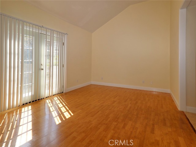 Master Bedroom & French Doors to Patio and Water Feature.