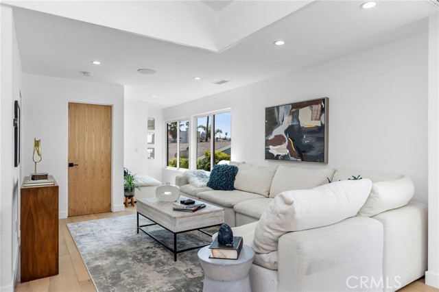 An abundance of light and views flows into the living area from the huge picture windows.