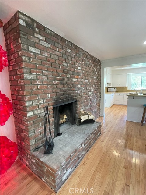 Other side of 2-way fireplace in family room