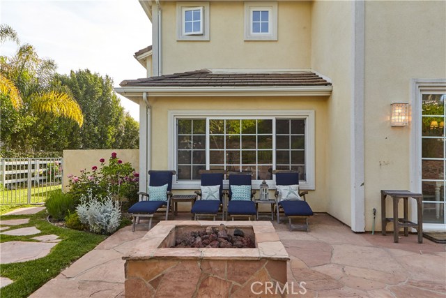 Oversized stone faced fire pit