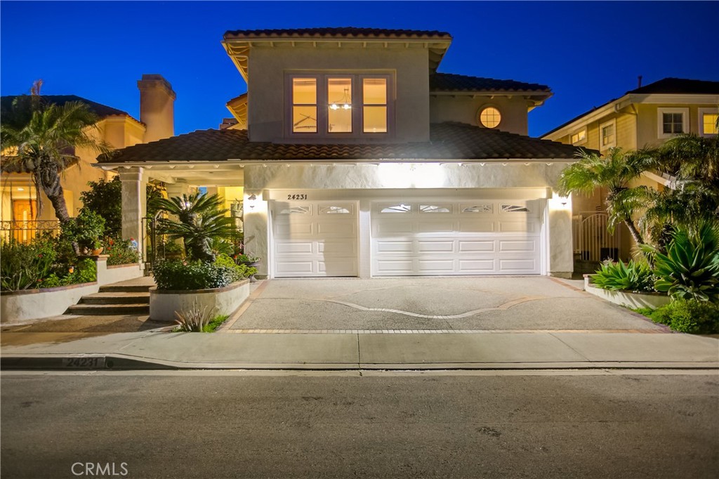 Exceptional living awaits in this 4 Bedroom 4 Bath residence home with a killer view situated on a single loaded cul de sac street in the highly sought after community of Chatelain Estates in Laguna Niguel. This home boasts one of the most popular floorplans with soaring ceilings, a main floor bedroom with full bath close by, a large living room, spacious formal dining room and the heart of the home that showcases a stunning kitchen with a grand family room with fireplace for ultimate entertaining. Light and bright is an understatement for this home and key features include gorgeous wood look tile flooring, designer paint, an elevator to make getting to the second floor super convenient. The gourmet kitchen features captivating picture windows, beautiful stone countertops, classic white shaker cabinets accented with some chic glass doors, a farm basin sink, stainless steel appliances and an oversized eat at island. Upstairs is two large secondary bedrooms one with an on-suite totally upgraded bathroom and the other one utilizes and upgraded hall bathroom. A giant loft space perfect for a game room, home theater or upstairs living room is situated between the two bedrooms. The primary retreat has vaulted ceilings, built in cabinetry, a cozy stack stoned faced fireplace, French doors that open to the balcony  that has its own stair case to the backyard and where you can watch the sunset and enjoy the amazing views with a glass of wine or that morning cup of coffee. The Spa like primary bathroom presents well with  fabulous tile flooring, a chandelier, a jacuzzi soaking tub, dual sink vanity, a large step in shower, and a sizable walk in closet. Other incredible bonus items include direct access to the 3 car garage, an inside laundry room and a private backyard stylishly designed with magnificent paver flooring,  covered  patio area, outdoor kitchen, hardscape planters, and also plex panels to afford scenic views.  You will enjoy a luxury lifestyle close to renowned beach, shopping malls, 5 star dining, award winning schools, Salt Creek Beach, Dana Point Harbor, Laguna Beach, 6-star resorts, and world class golfing. Hurry this home will not last since this home is a true gem.