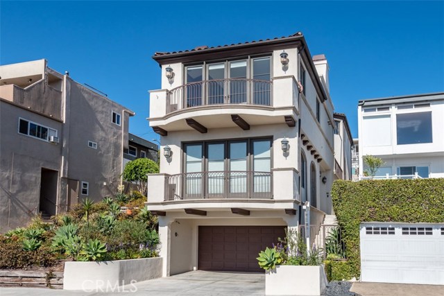 1744 Hermosa Avenue Hermosa Beach, California An incredible opportunity in the highly sought after area of north Hermosa Beach! With unblockable ocean, whitewater and sand views, this custom 4 bed, 4 bath home is a rare find and offers the best of indoor/outdoor living. Located a block from the beach, a few blocks to Hermosa's Pier, shopping and restaurants and a short bike ride down The Strand to Manhattan Beach! On the entry level there are 3 large bedrooms (one with ensuite bath), laundry room and a full bathroom. The entertaining area has an updated chef's kitchen, powder room and an ocean view living room with a balcony to enjoy the fresh ocean breezes. A formal dining room opens up to a large outdoor patio perfect for dining al fresco on warm summer nights. The top level boasts a large master suite complete with unblockable ocean views through a set of French Doors that invite in the ocean breeze anytime of day. A large rooftop deck with outdoor fireplace, 180* unblockable, ocean, sand and Strand views is perfect for entertaining. The home has 7-car onsite parking, unheard of in the Hermosa Beach Sand Section! Two, 2-car garages plus an additional 3 parking spots. The garages have ample storage, perfect for storing your beach cruisers, golf cart and surf boards. Hermosa’s spectacular beaches, award winning schools (choice of Mira Costa or Redondo Union High School) and great year round weather are some of the many reasons this is the place to live. There is no lifestyle like the beach lifestyle! www.1744hermosa.com