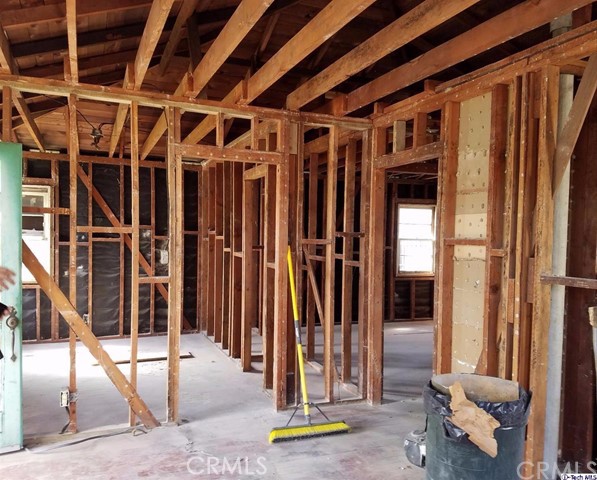 From Living Room toward front bedroom and hall to bath and bedroom