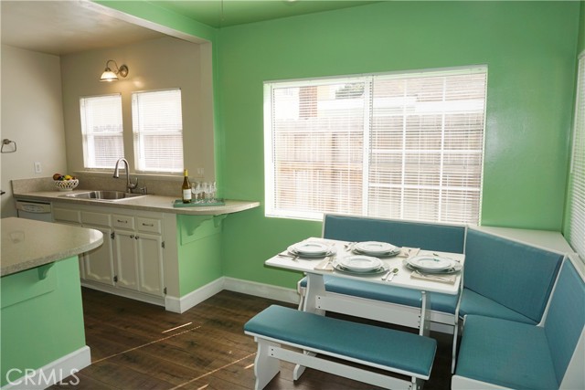 Kitchen sink area with dishwasher