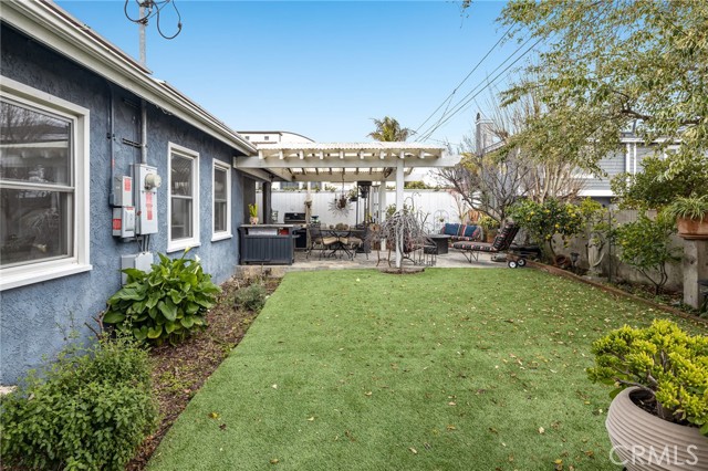 What a lovely day. Blue skies and in this backyard area. Drought tolerant and artificial turf.