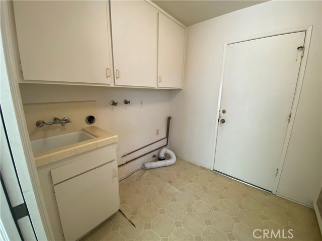In home laundry room off garage and kitchen