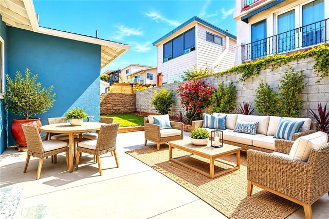 The Rear Yard has a Patio Area which could be Remodeled with Decking and an Overehear Trelllice or Patio Covering. Virtually Staged