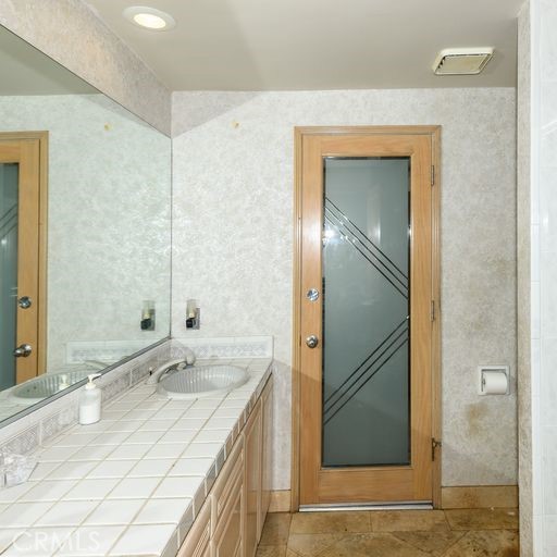 hallway bathroom looking towards the pool