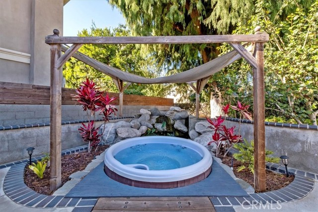 Waterfall/Pond behind spa has koi fish!