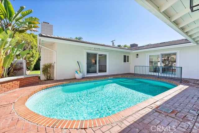 Easy to heat Pool with brick patio