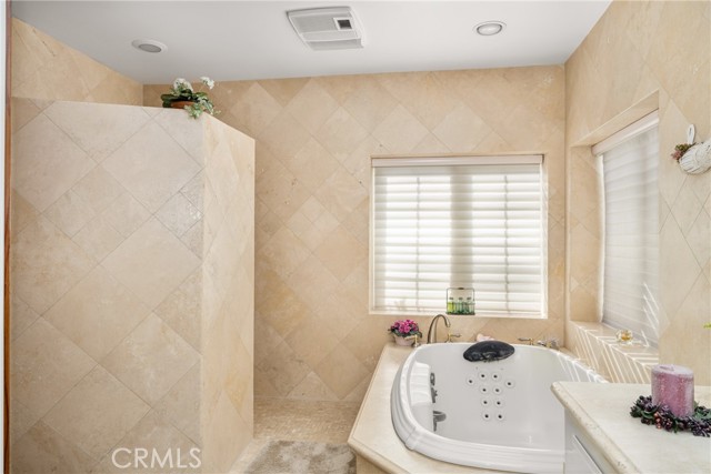 Relaxing Spa-Like Bathroom with Jetted Tub and Walk-In Shower