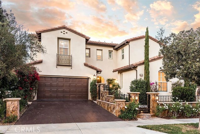 105 Bottlebrush Irvine, California Privacy and Elegance await you at this beautiful "Chantilly" Plan 2 home on a quiet Quail Hill cul-de-sac with SPECTACULAR VIEWS for miles! This spacious home in one of Irvine's most popular resort-like communities features 4 Bedrooms/4.5 Baths and over 3,000 sqft. of space. A lovely gated front entrance creates a formal walkway with a fountain and custom hardscape. The foyer draws you in to the home, and opens to formal dining room perfect for entertainment. Downstairs bedroom suite connects to an open loft/office area and full bath. Spacious family room features surround-sound speaker system and cozy fireplace. Chef enthusiasts can enjoy exclusive kitchen amenities- Granite countertops, Frigidaire stainless steel appliances, 6 burner stove, and built-in range! Over-sized island provides counter-top seating and additional kitchen sink. Classic French doors lead to a dream backyard w/covered gazebo, built-in BBQ, patio seating area, and stone fire pit. Retreat to a master suite w/a private balcony, walk-in closets, separate tub/shower, and his/her closets. Additional bedrooms feature ensuite bathrooms. Luxurious imported marble flooring, crown moldings, and custom finishes! Walking distance to Alderwood Elementary, and situated in the University High School District of Irvine. Enjoy resort-style living w/ 5 local community parks, 3 swimming pools, Fitness Center, hiking trails just steps away! Close to world-class shopping and dining, and only 7 miles to Laguna Beach!