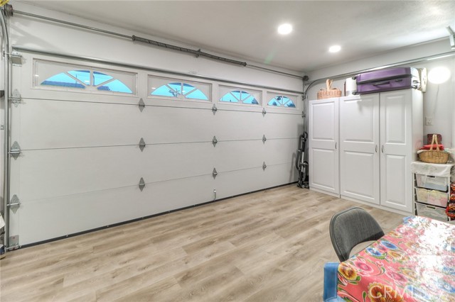 Newer insolated double garage door with automatic opener.