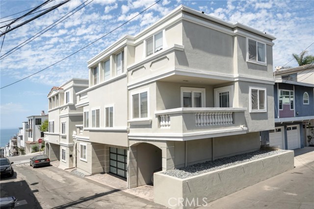 305 15th Place Manhattan Beach, California Manhattan Beach living at its finest. This 2100 sq ft ( buyer to verify) 4 bedroom, 4 bath (3 full & 1 half), ocean view, 3 level townhome is located in the perfect setting. Just 2 blocks west to the beach and 2 blocks south to downtown Manhattan Beach. This unique home offers 6 PARKING SPOTS!!! A welcome feature for your family & friends in a community where parking is a premium. The master suite has a walk in closet, double sinks & updated shower, as well as a balcony over looking the ocean. The 2nd bedroom turned office also has a walk in closet and adjoining balcony to the 3rd bedroom. The 4th bedroom (1st floor) has a Murphy bed to make the space more flexible with an en suite full bathroom. The stunning 3rd level living area offers a step up kitchen w/marble floors and ocean views, new refrigerator, wine cooler & stainless steel appliances. The separate dining room is made to entertain. The living area boasts maple hardwood floors, fireplace & spectacular ocean & pier views, with steps to a newly tiled patio. The garage is fully remodeled w/acrylic floor, cabinets plus a secured locked storage area for valuables. Additional features include underground utilities, EV vehicle outlet, copper gutters, 3 level speaker system, and wired for ADP security.. HOA inactive.