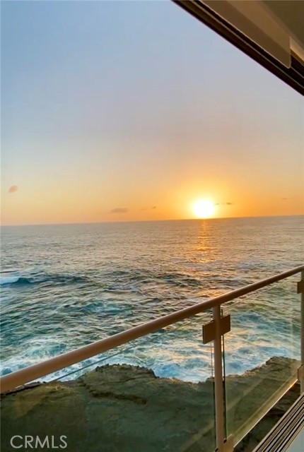Main bedroom with sunset views over the ocean
