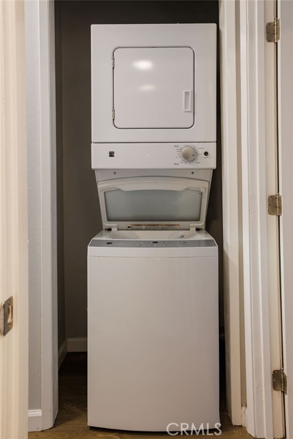 In-unit stacked washer and dryer included in the sale