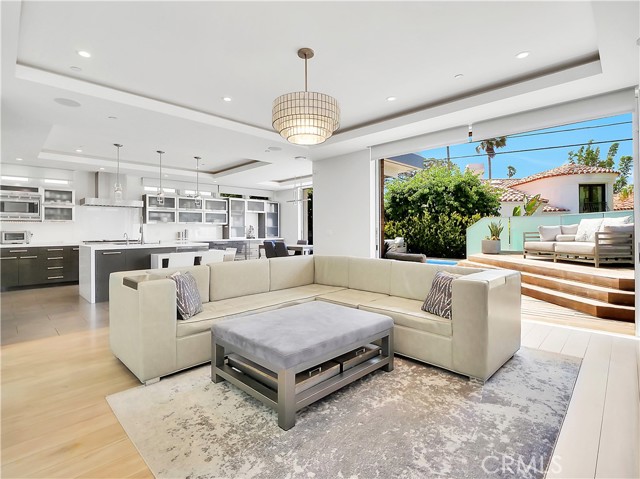 Floor to ceiling glass doors for indoor/outdoor flow.