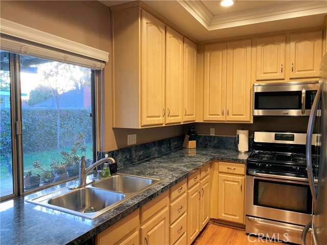 Large window brightens up kitchen with natural light