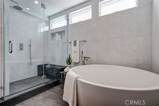 Master bath with Japanese soaking tub, etched marble walls