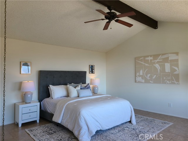 Primary Bedroom with vaulted ceiling