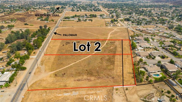 5.19 Acres..total. The front parcel is 4.78 acres of Commercial. the small strip of RR at the rear could be a buffer to the residential. 

Heart of Wildomar, Palomar Rd Frontage. Earth Quake Studies done and available. Flat to gentle property with paved road frontage Power and Phone near, and in the path of progress. Water across the street near Palomar St. Sewer close by.  this property is Ready for your Commercial use.

Retail/ Commercial uses.