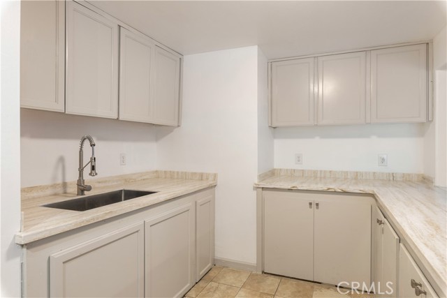 Kitchen area inside the one bedroom apartment.