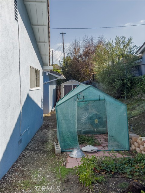 Fruit trees and vegetable garden East side yard