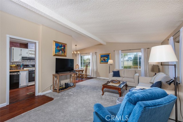 Living Room showing Kitchen & Dining Room