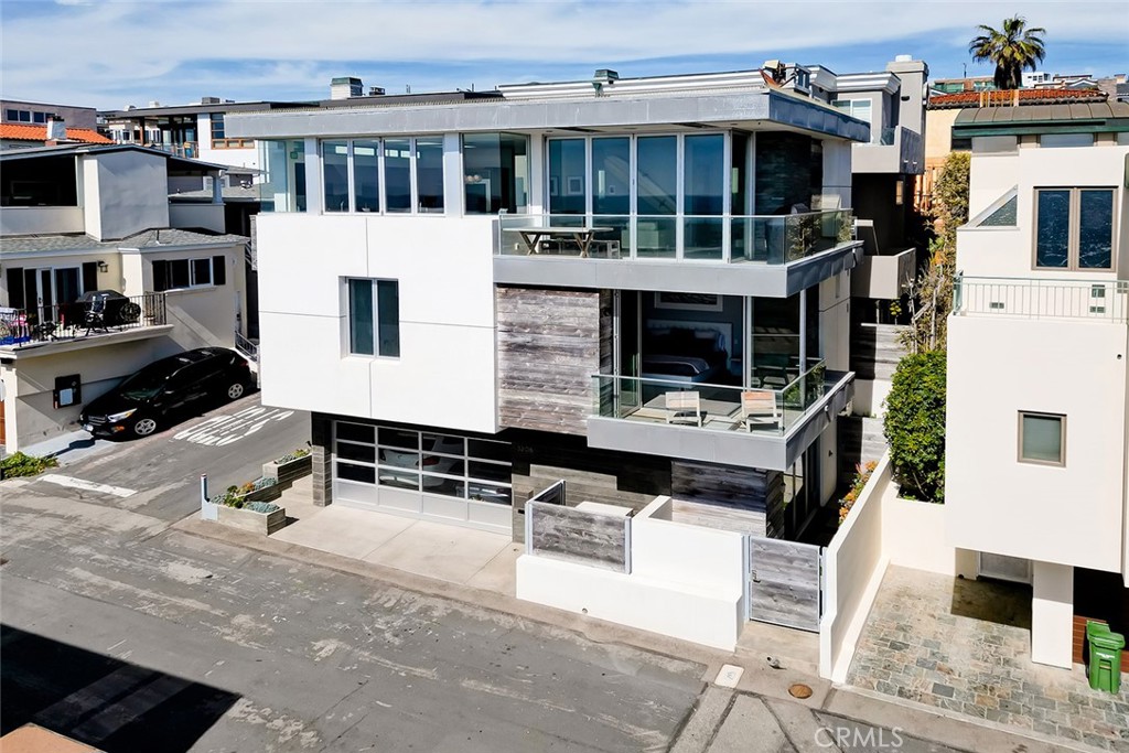 3208 Ocean Drive Manhattan Beach, California Summertime in paradise! Beautiful coastal contemporary home located just steps to one of the most coveted stretches of beach in California. There are 3 bedrooms plus a large media room/basement. The views from the home are nothing short of spectacular. Panoramic ocean views stretching from Palos Verdes to Malibu and beyond. The home is ideal for entertaining with a wide open top floor living area nano type sliding doors, central multi zone Air Conditioning, fully integrated ''Savant' smart home, 2 car garage and impeccably furnished. Lease term is flexible. Short or long term. Click on VTour icon for layout and floor plans. One of the coolest homes on the beach!
