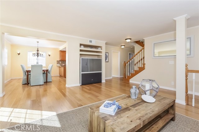 Living Room to Dining Area and stairs to 2nd floor