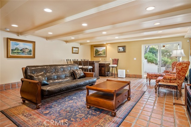 Painted beam ceiling adds so much character along with the Saltillo tile floors.