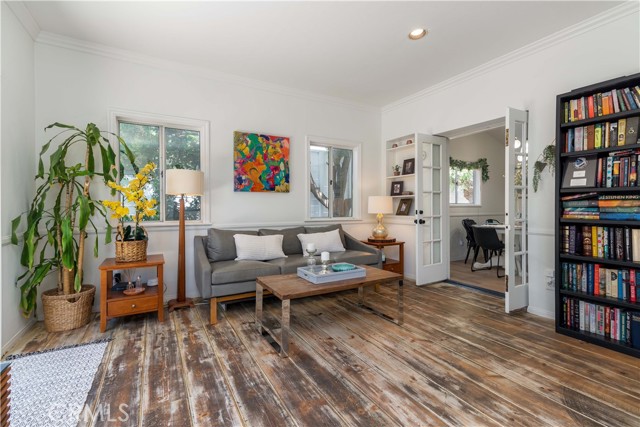 The owners created this space by stripping the original painted floor to show the real wood floors...
