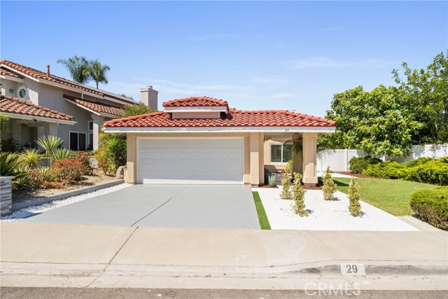 Welcome to 29 Saint Croix, a beautifully remodeled single-story residence in the highly sought-after Mariners Bluff neighborhood of Laguna Niguel. This two-bedroom, two-bathroom home offers the perfect blend of quality, comfort, and tranquility in an unbeatable location. Upon entering, you are greeted by an open floor plan filled with natural light, vaulted ceilings, and a seamless flow from the spacious living room with a cozy gas/wood-burning fireplace into the dining area and kitchen. The newly upgraded kitchen is a chef’s delight.
The primary bedroom is a luxurious retreat, boasting an ensuite bath with a dual sink vanity, an expansive walk-in shower with pebbled stone flooring, and dual shower heads. The secondary bedroom and adjacent bath are equally impressive, providing ample space and privacy. This home is just a short distance from Dana Point Harbor, local beaches, shopping, dining, and convenient access to freeways and toll roads. Don't miss the opportunity to own this stunning, move-in-ready home in Mariners Bluff!