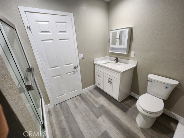Large bathroom with storage and room to get dressed and additional privacy when you have guests.