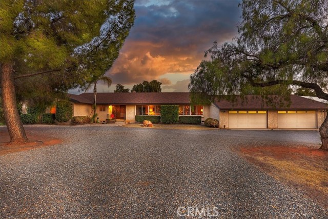 Truly a rare find!! Never-on-the-market 2950 sq.ft single story classic ranch style home on 4 usable acres. Private and secluded but only minutes to the freeways. The property includes a 4 car garage plus a huge 3,000 sq.ft warehouse/workshop. There is also plenty of room to build an ADU all the while maintaining complete privacy. The home was built with quality post and pier construction and has solid bones. Long range mountain and canyon views from almost every room. Adjacent to this beautiful property is an open space conservation area.  The property uses a 40 year-old well which pumps approximately 25gpm; natural, pure, and delicious.  Well mechanicals are all-new having just been replaced. The possibilities are limitless here; Build a nursery, maintain your car collection, or run your construction company and live with your family all on one piece of land.