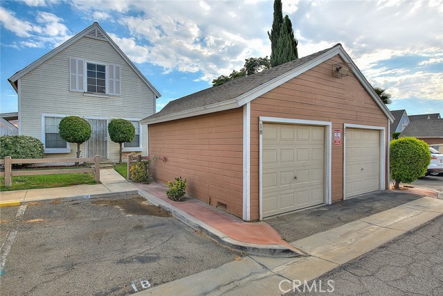 Detached garage and assigned parking space right in front of the home