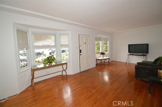 Living area of front ground floor 2 bedroom. The windows allow for lots of light.