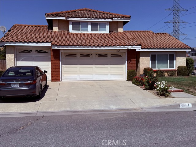 Front of house three car garage