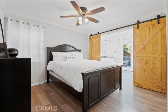 Primary Bedroom Suite- barn doors open into luxurious bath.