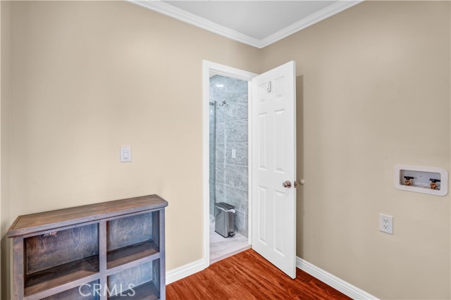 Hallway with desk nook for those who work from home or for content creators, and the washer and dryer hookups.