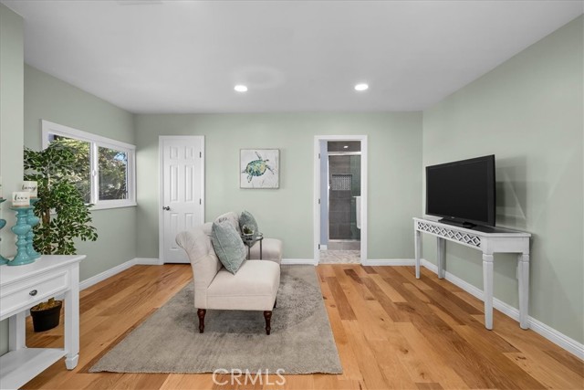 Upstairs primary bedroom sitting area.